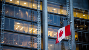 Canada flag in front of building